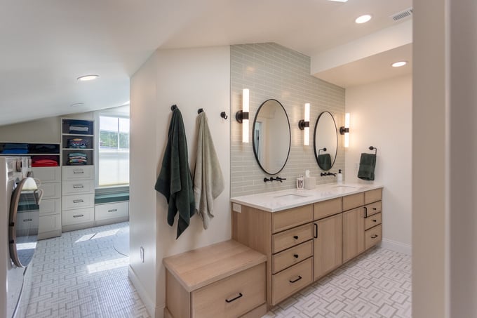 Cincinnati master suite remodel with sloped ceiling design and open closet by Legacy Builders Group