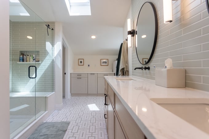 Quartz countertops on double vanity in Cincinnati, OH bathroom remodel by Legacy Builders Group
