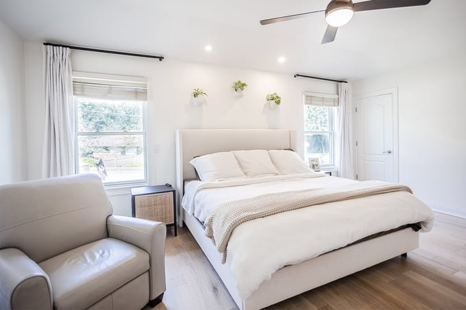 Bright contemporary bedroom in the Cincinnati area with neutral tones and modern decor