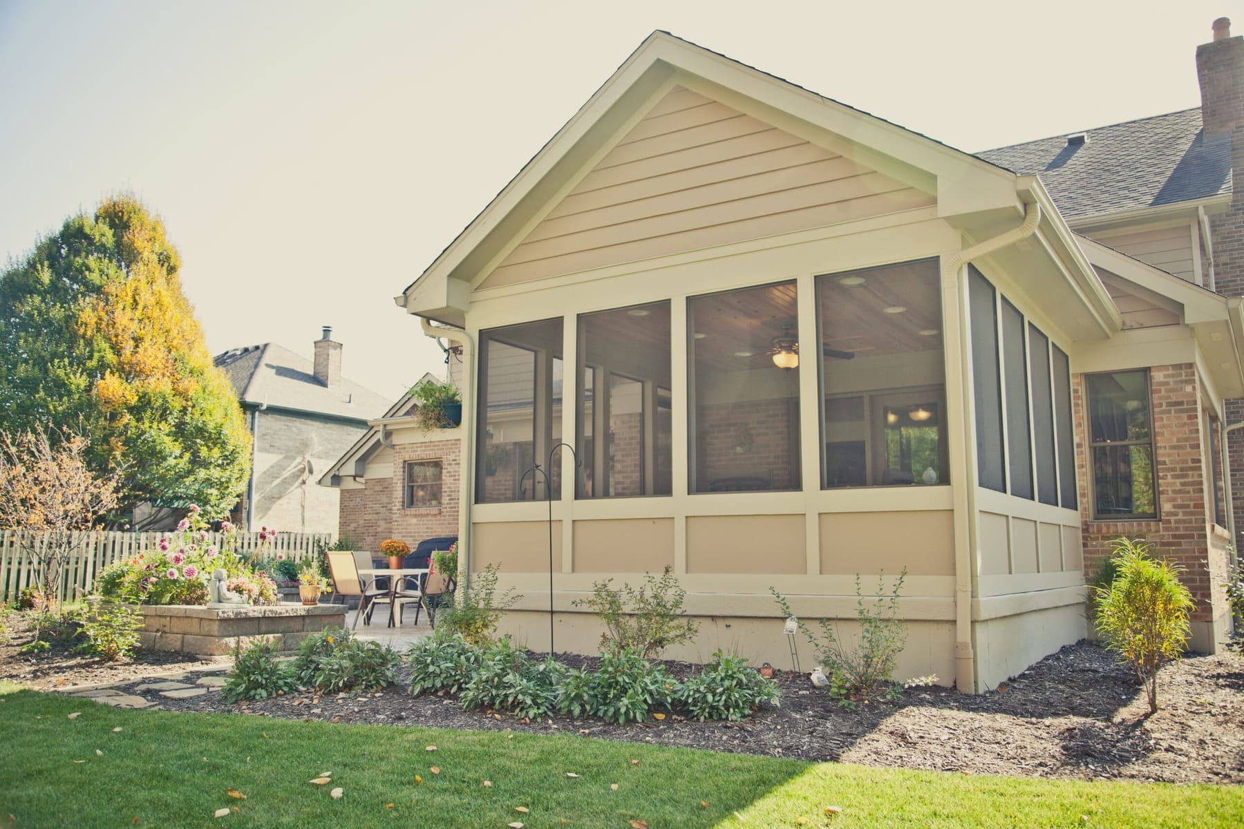 Screened-in porch addition with patio and landscaping by Legacy Builders Group in Greater Cincinnati