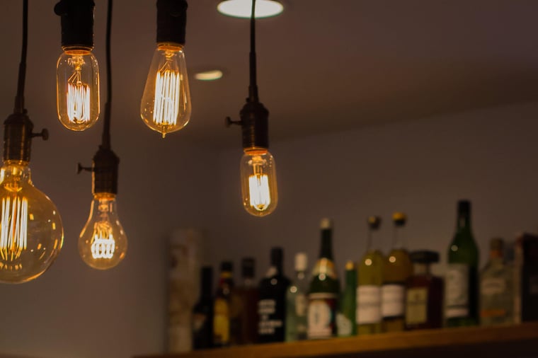 Shot of glass pendant kitchen lighting hanging from ceiling in Cincinnati kitchen renovation