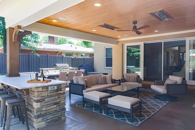 Stamped concrete outdoor living remodel in Cincinnati with custom bar area and grill