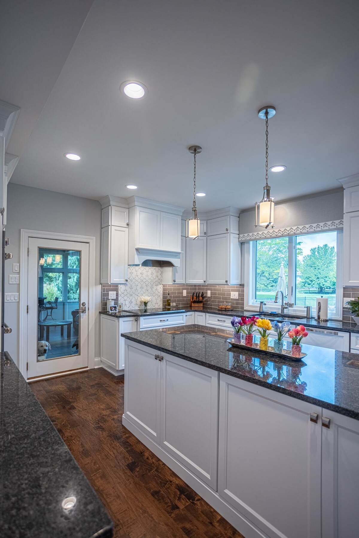 Kitchen remodel with recessed and pendant lighting above island