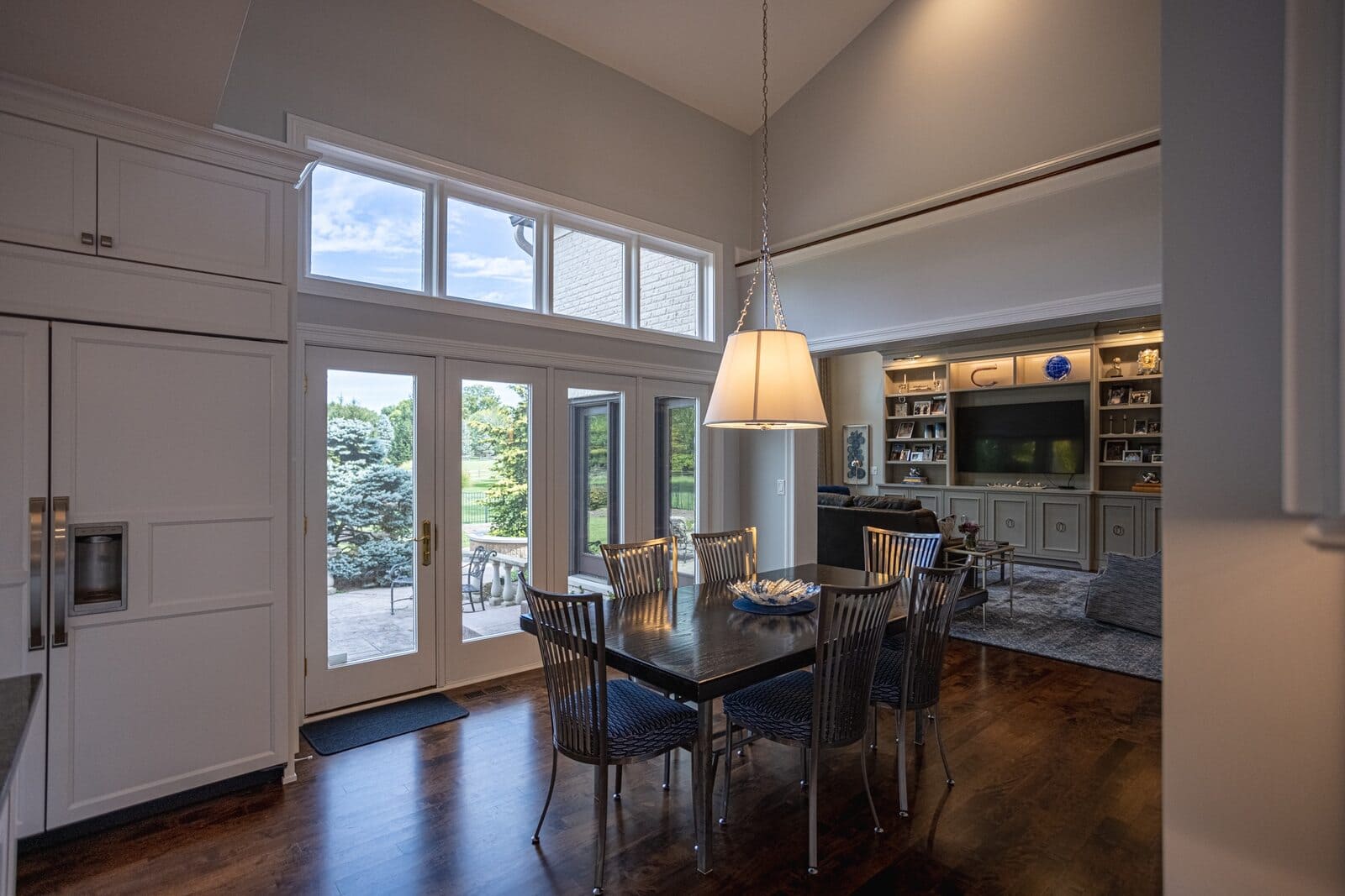 Open concept first floor remodel dining area with view of family room