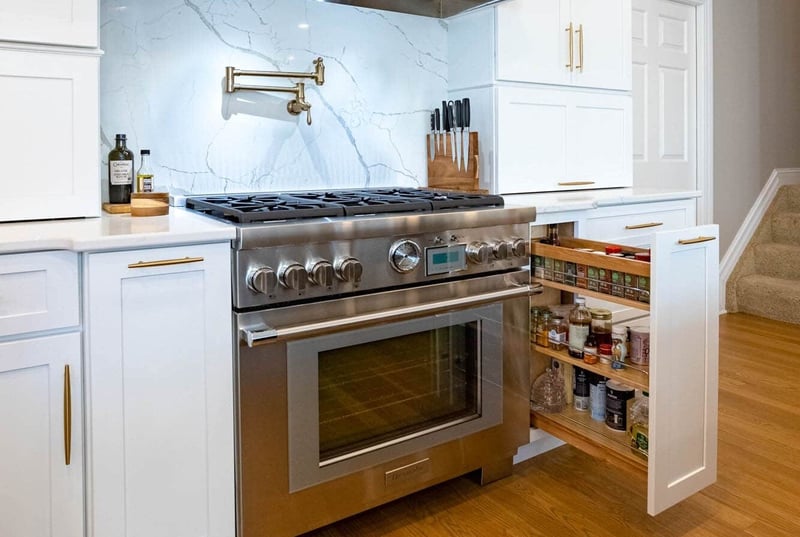high-end-stainless-steel-range-and-custom-white-shaker-cabinets