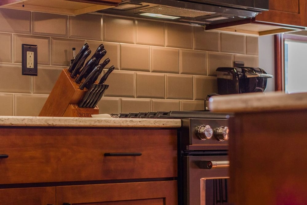 Maple kitchen cabinets with dovetail drawers and quartz countertop