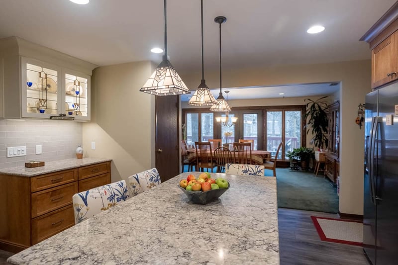 stain glass kitchen island leading into dining room