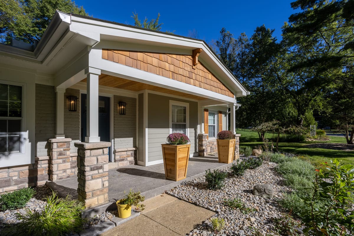 Front porch addition with stacked stone features in Montgomery, Ohio Front porch addition with stacked stone features in Montgomery, Ohio