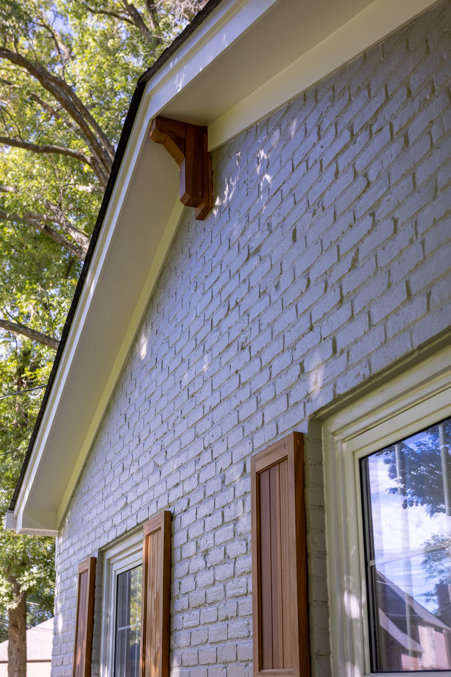 Painted brick and window shutters on Montgomery, OH exterior remodel