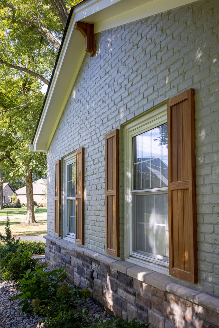 Painted brick siding and stone veneer on Montgomery, OH exterior home remodel