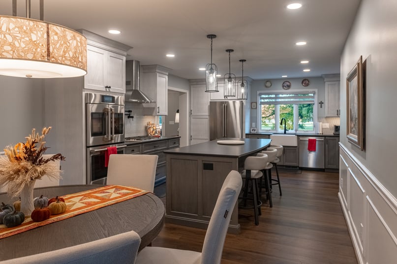 Poplar two toned kitchen cabinets with double oven in Montgomery, OH kitchen remodel by Legacy Builders Group