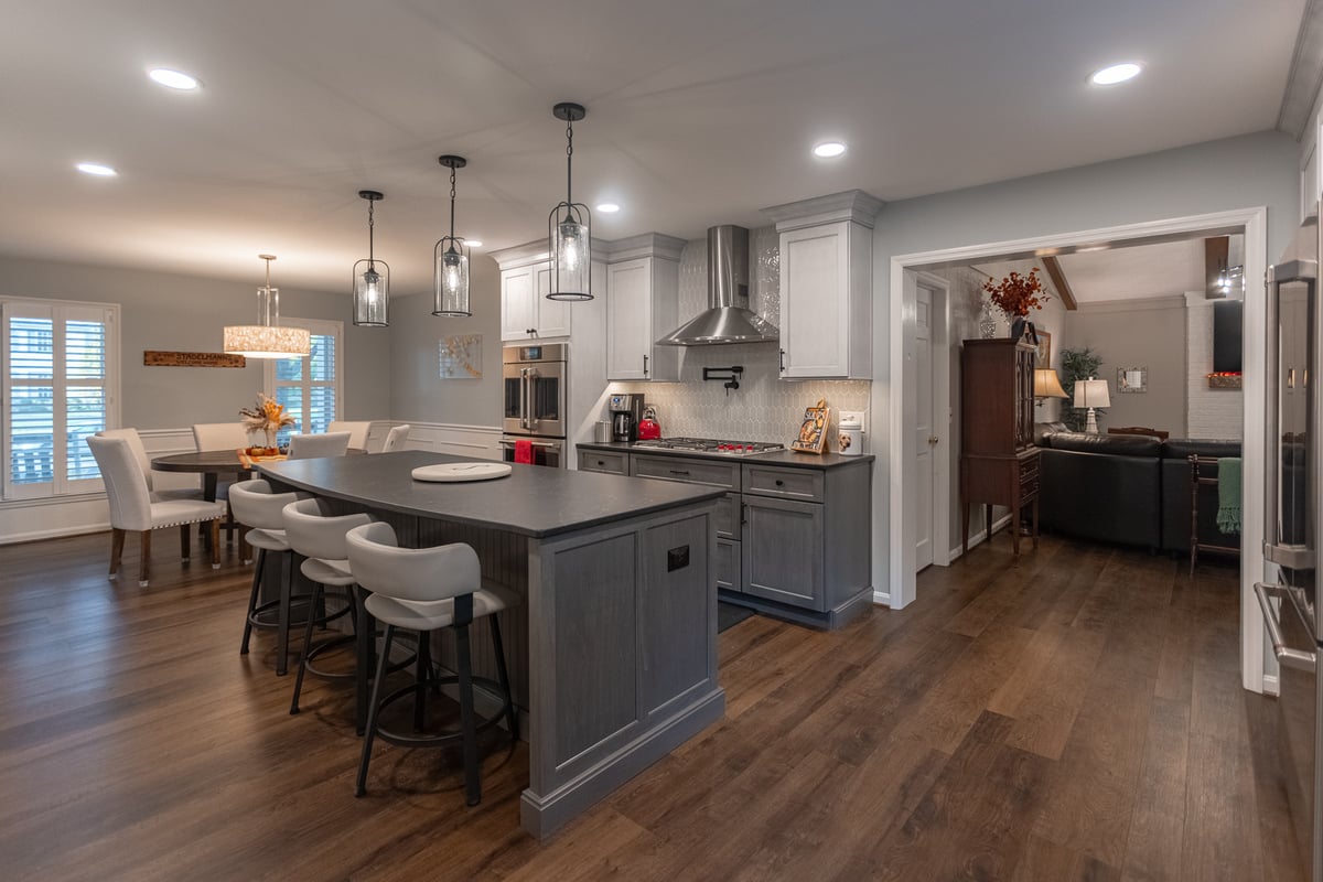 Kitchen remodel in Montgomery, OH with island and double oven and adjacent living room
