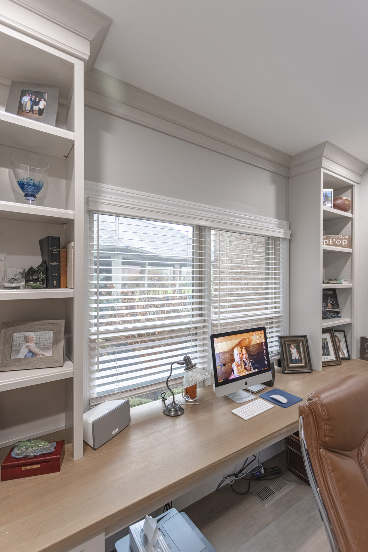 Custom home office remodel in Cincinnati, OH with built-in shelving features