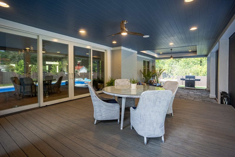 Year-round patio in Montgomery, Ohio by Legacy Builders with recessed lighting