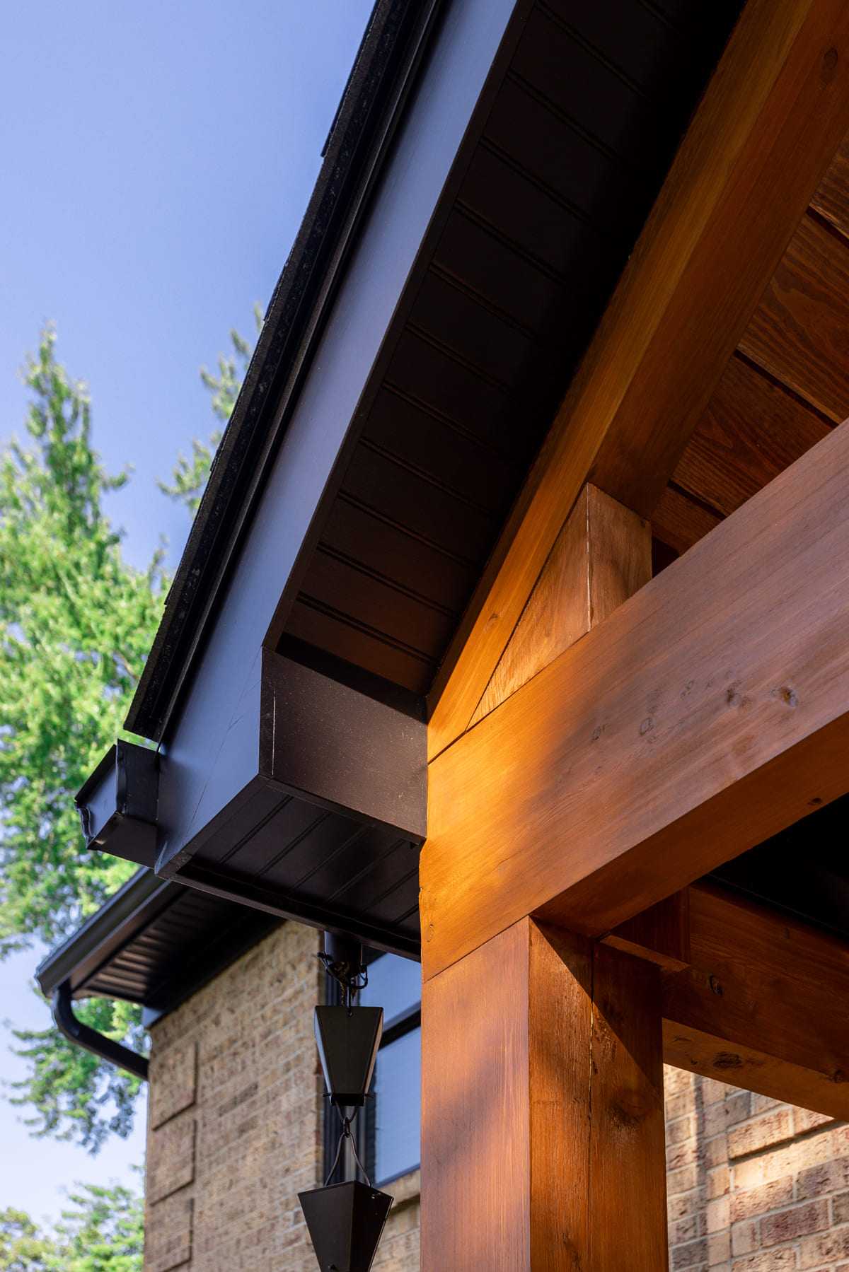 Cedar porch posts on porch with a frame roof