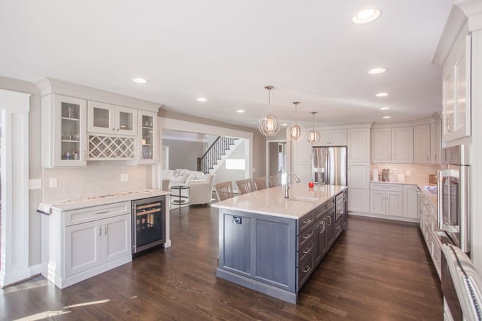 white shaker style cabinets with large island