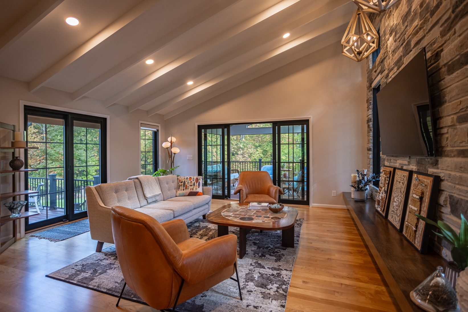 Evendale, Ohio great room addition with sliding glass doors to outdoor living space by Legacy Builders