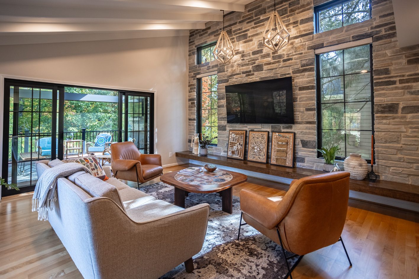 Stone wall in open-concept Evendale, Ohio great room addition by Legacy Builders