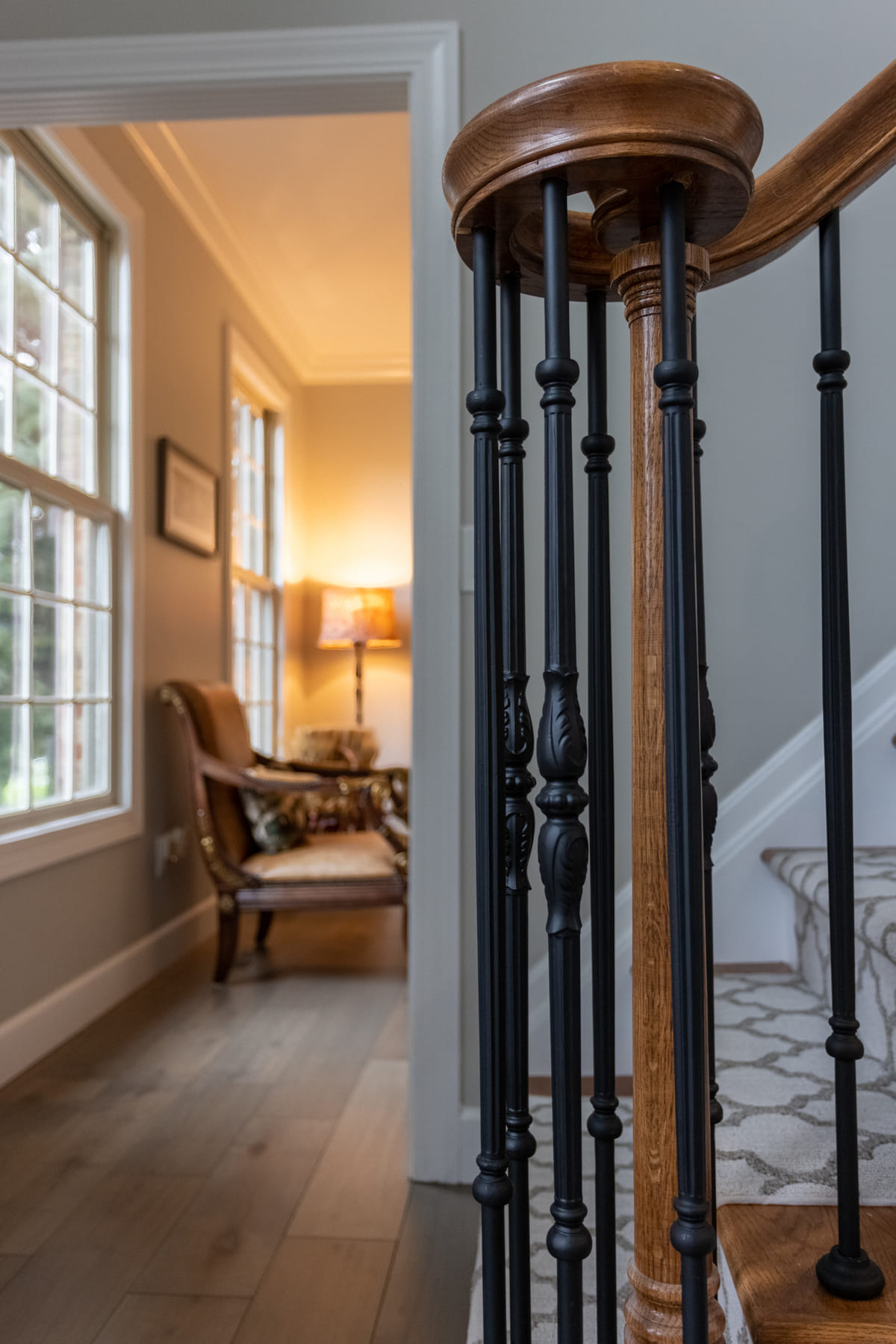 Renovated staircase railing detail in Cincinnati, OH foyer